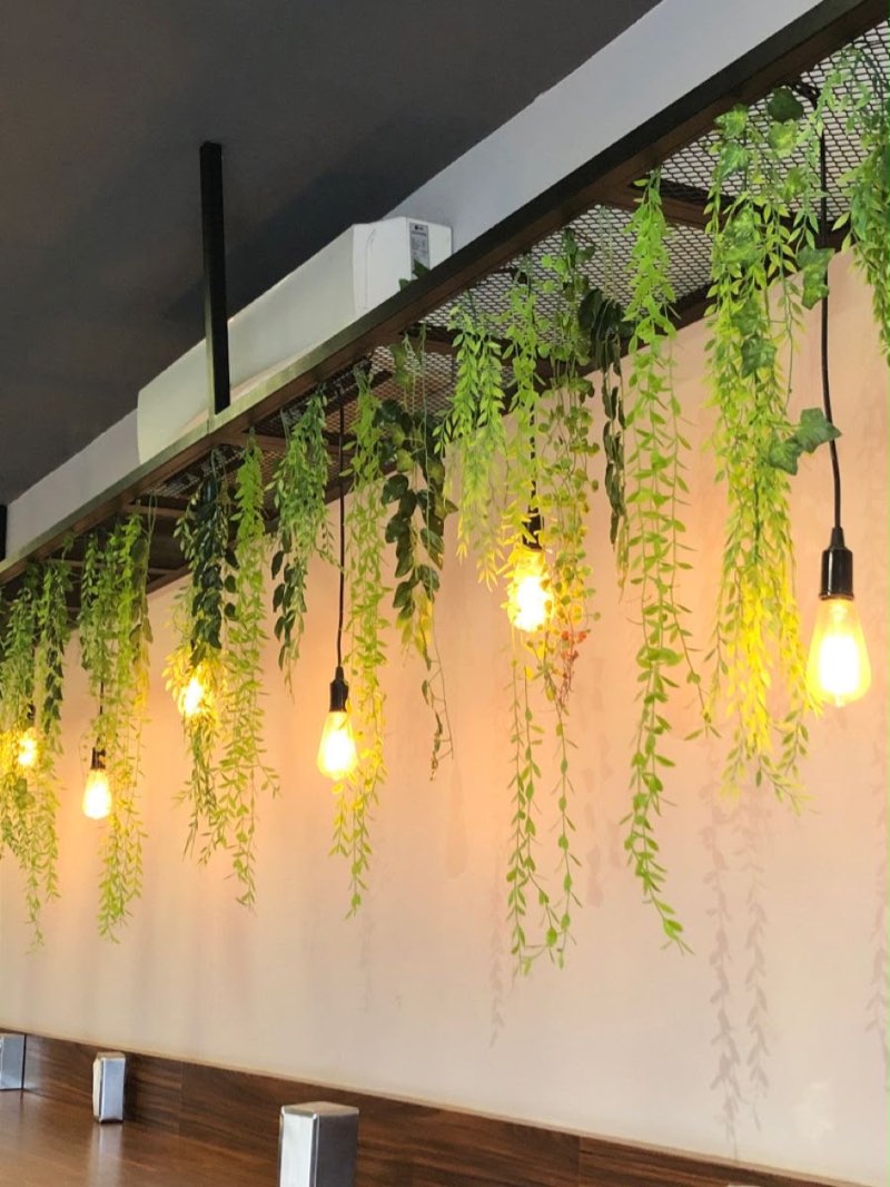 Artificial greenery installation by Afloraa