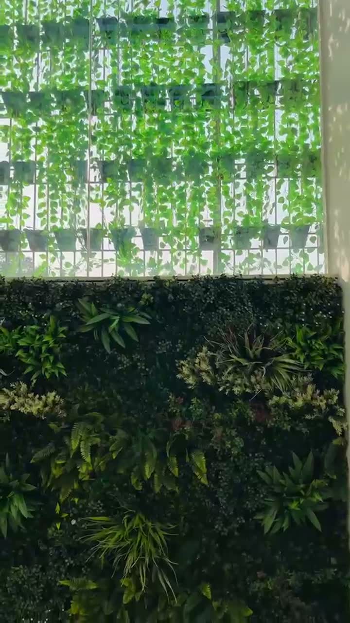 Artificial green wall installation by Afloraa