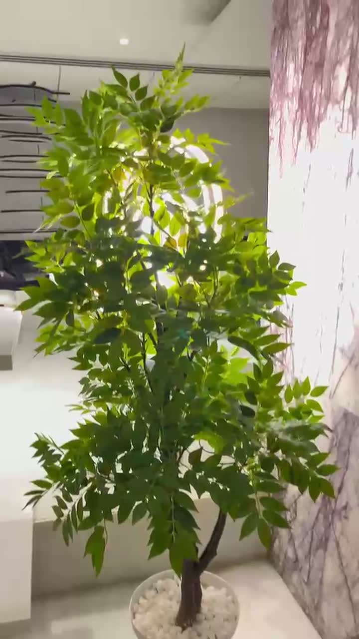 Artificial tree installation by Afloraa
