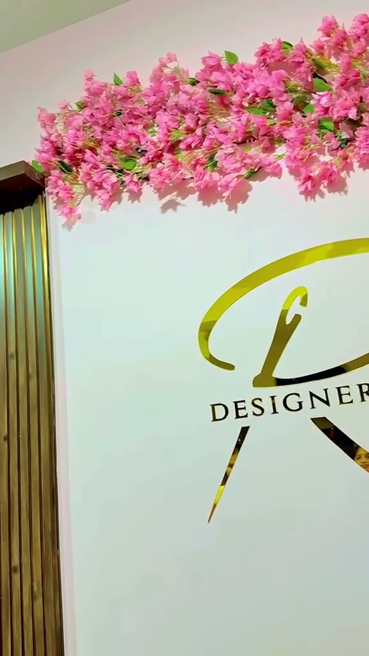 Branded logo green wall by Afloraa