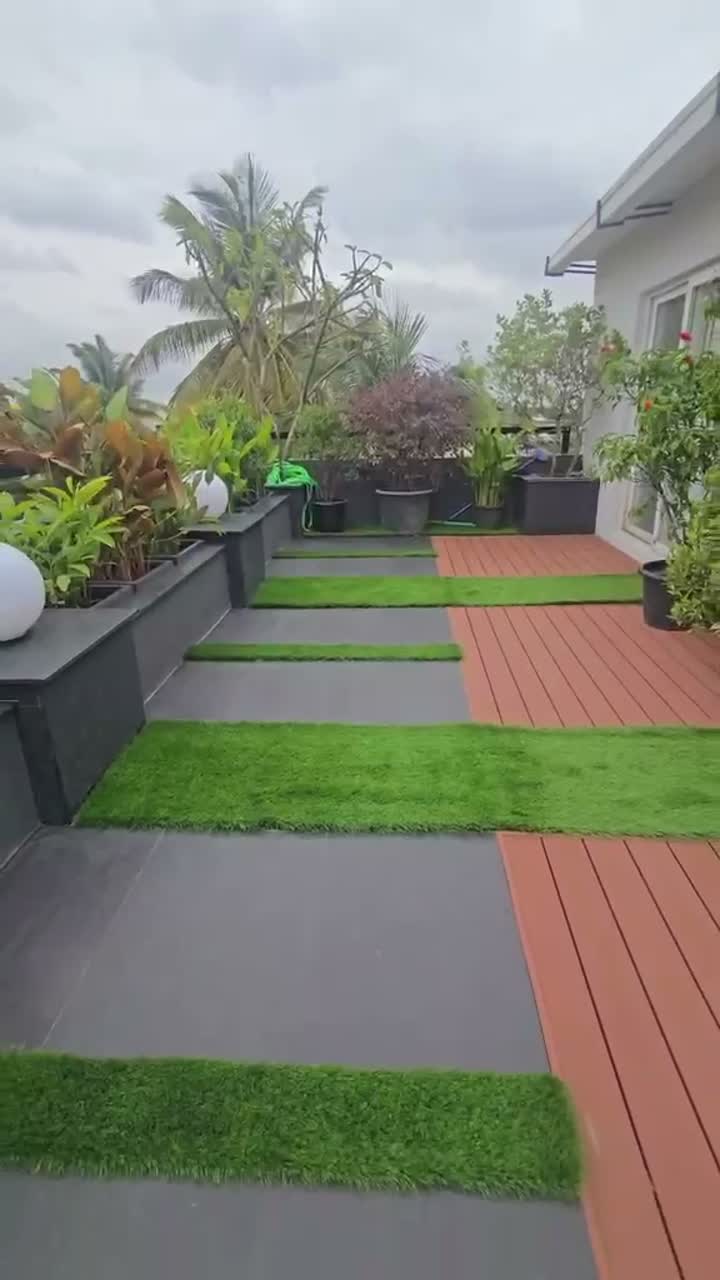 Terrace landscaping with artificial grass by Afloraa